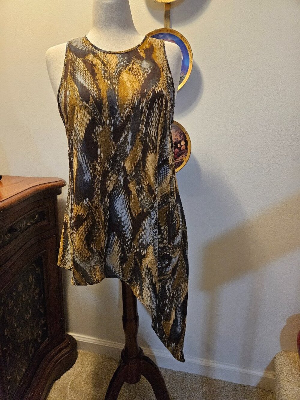 Asymmetrical rayon sleeveless blouse